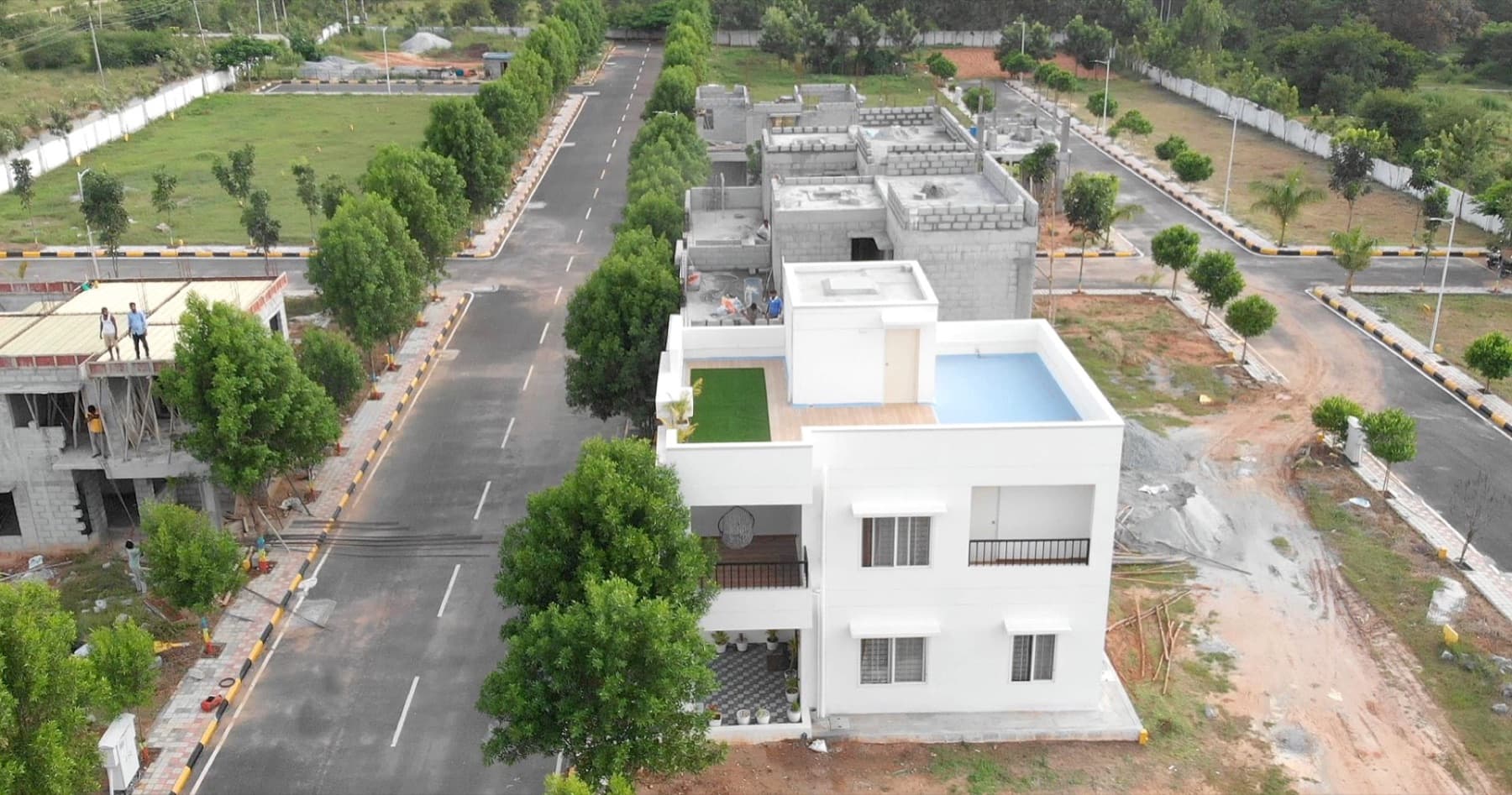 Aerial view of Medhyam Serenity Highland with villa homes and internal roads